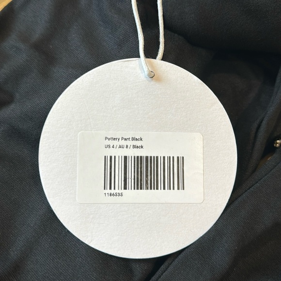 Princess Polly, Size 4. Black with Rhinestones on Arm Cuffs and Pant Legs. NWT - Picture 2 of 7